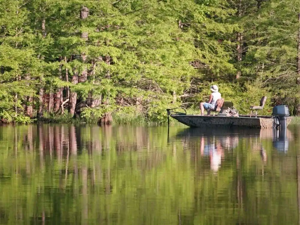 Fishing on in a boat on a lake in Texas