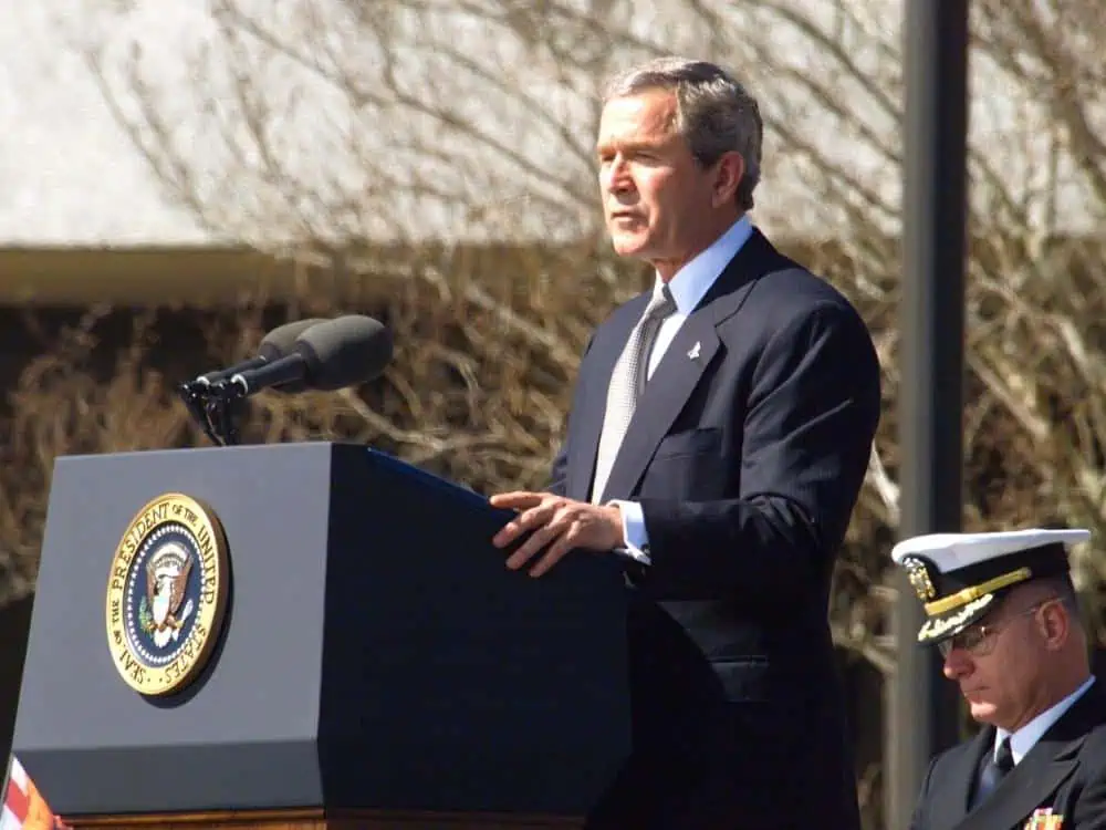 President George W. Bush Before The Crowd On The Mall Of The Johnson Space Center During The Memorial For The Columbia Astronauts Stated.