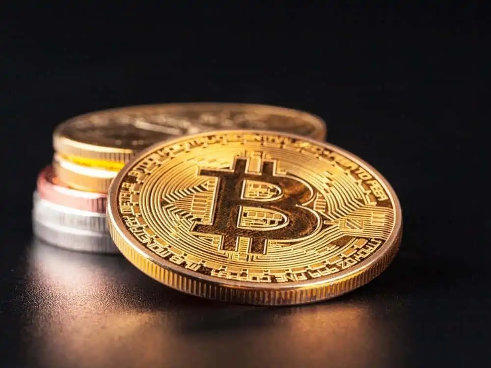 Golden Bitcoins On Black Background. Trading Concept Of Crypto Currency. - Texas News, Places, Food, Recreation, And Life.