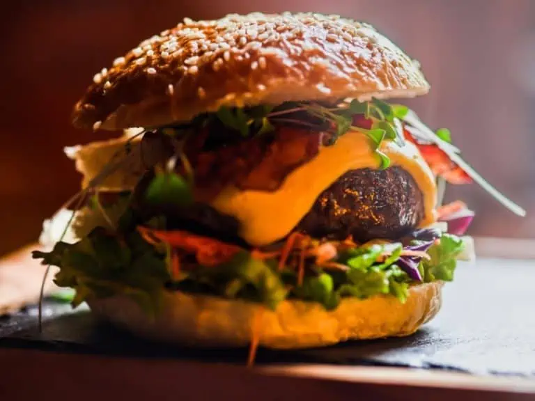 Typical american hamburger with meat cheese and different vegetables - Texas View