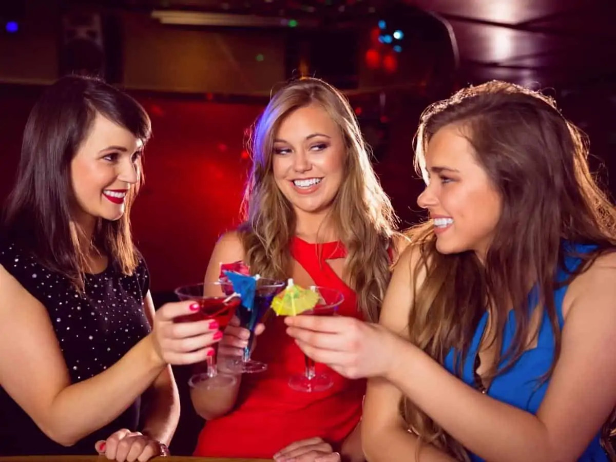 Friends Drinking Cocktails Together At Nightclub. - Texas News, Places, Food, Recreation, And Life.