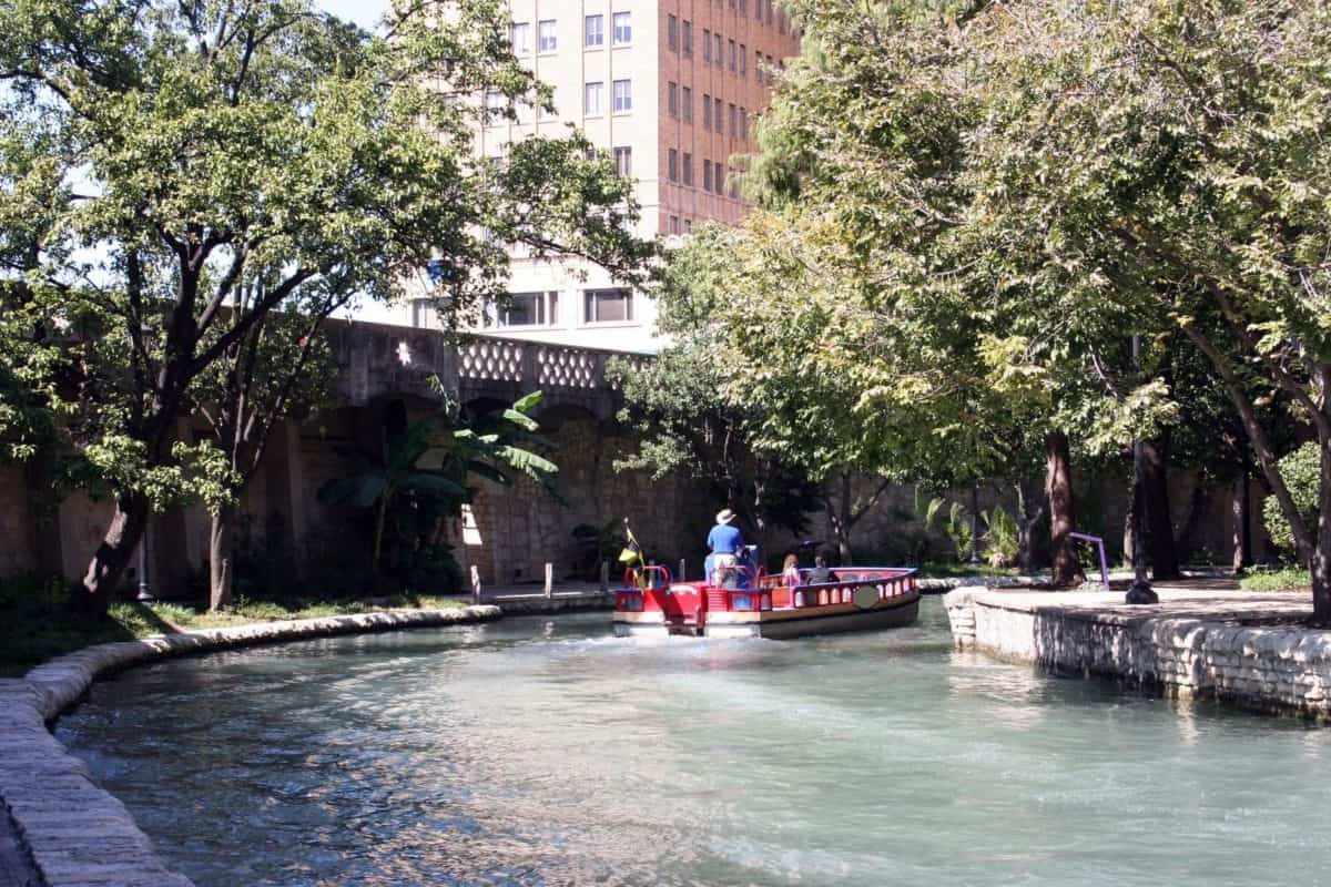 The Riverwalk in San Antonio Texas on a sunny day. This attraction is in the heart of downtown San Antonio. - Texas View