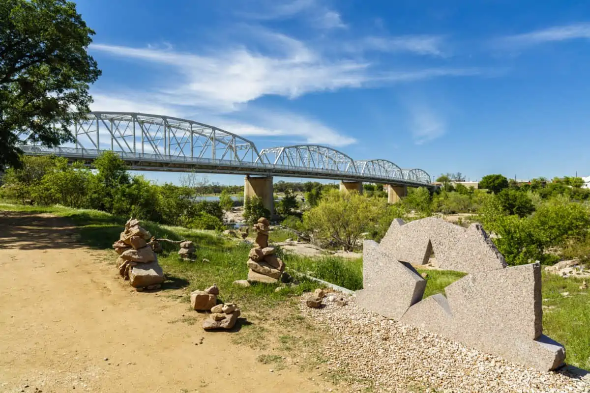 The rustic Highway 71 bridge over the Llano River in the small Texas Hill Country town of LLano. - Texas View