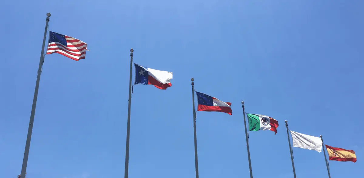 Six historical flags of Texas in a row. - Texas View