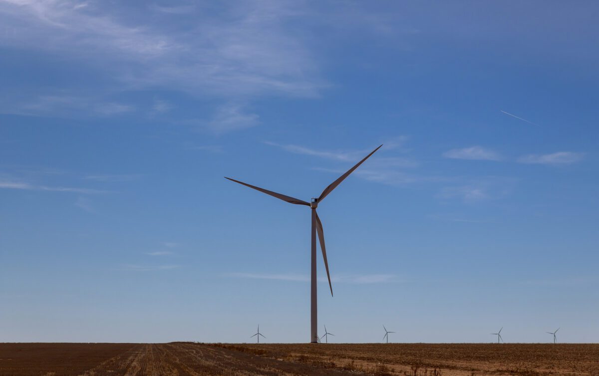A windmill with modern wind turbines in the located in West Texas sunny day - Texas View