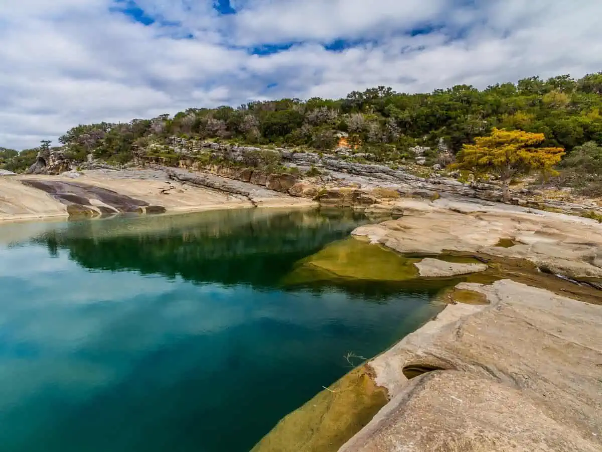 Beautiful Rock Formations Carved Smooth by the Crystal Clear Blue Green Waters of the Pedernales River. - Texas View