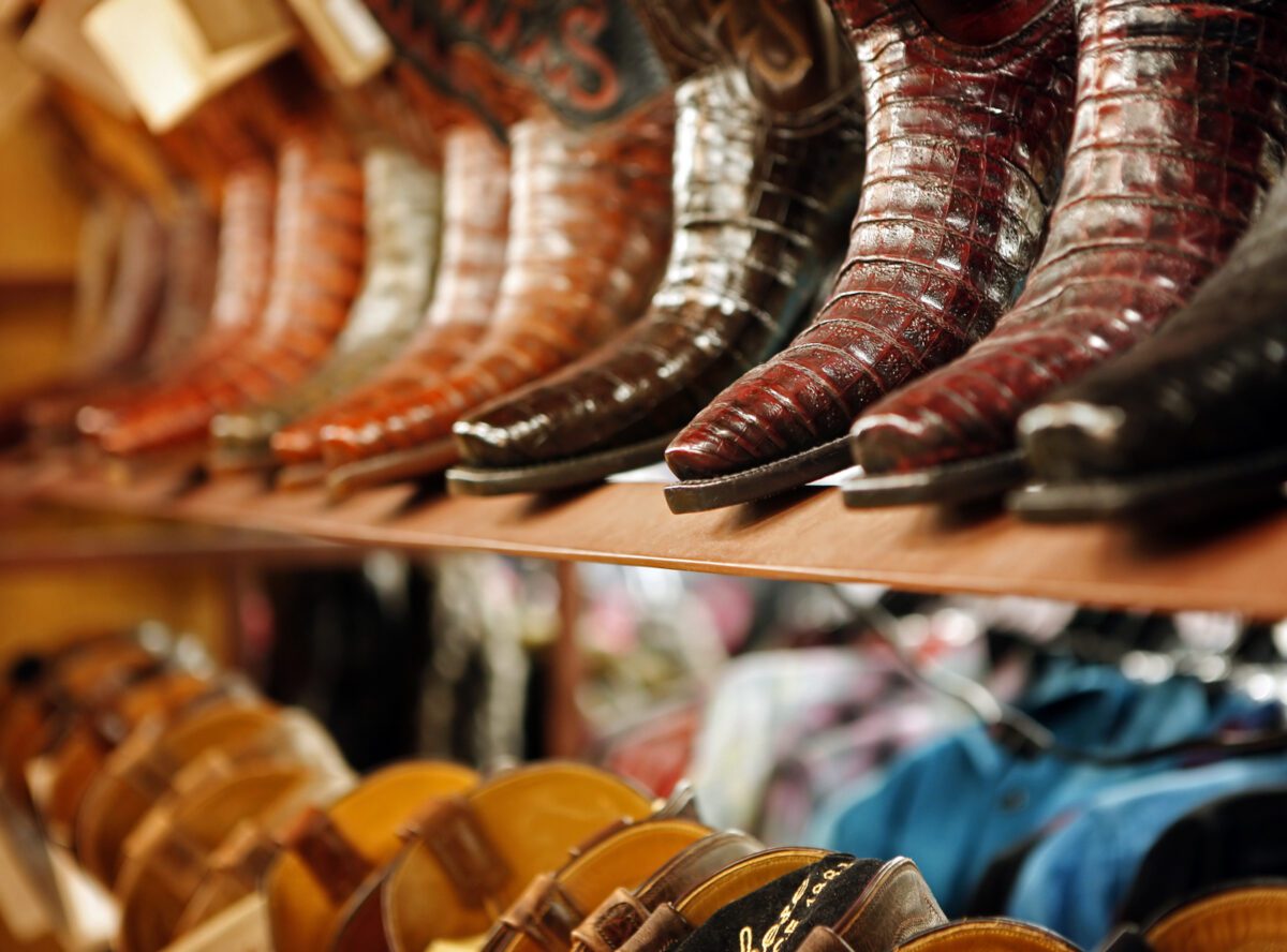 Cowboy boots in retail store. - Texas View
