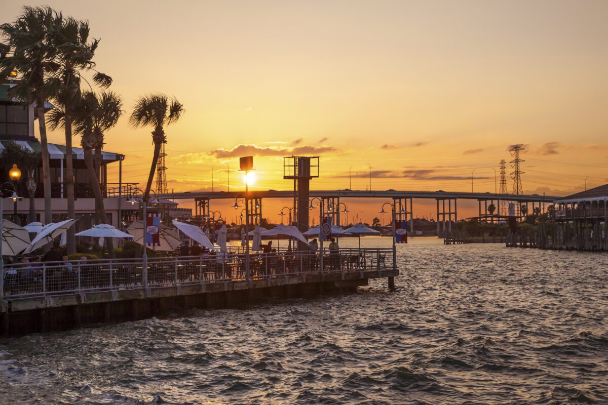 KEMAH TX USA APR 14 2016 Sunset at the Kemah Boardwalk. Kemah is a famous resort in the Galveston Bay area. Texas. - Texas View