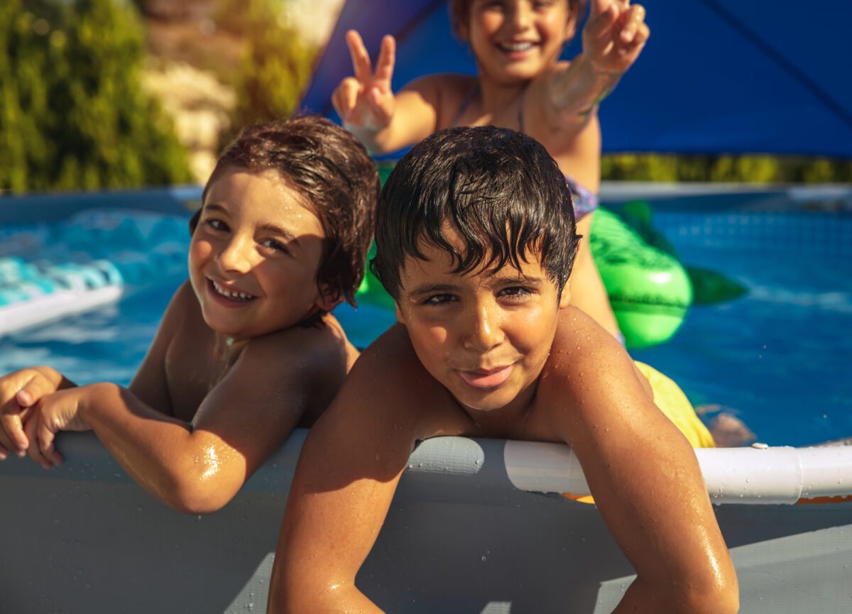 Happy Kids Having Fun in the Pool - Texas News, Places, Food, Recreation, and Life.