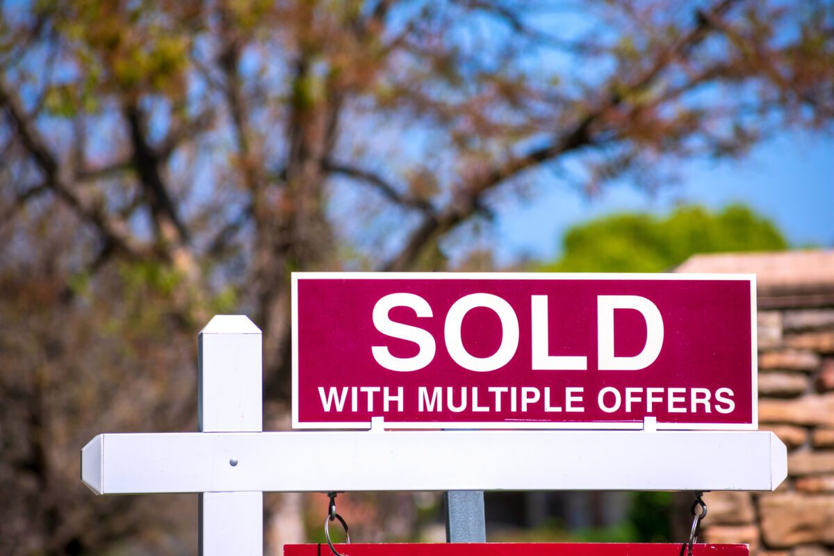 SOLD With Multiple Offers real estate sign near purchased house indicates hot sellers market - Texas View