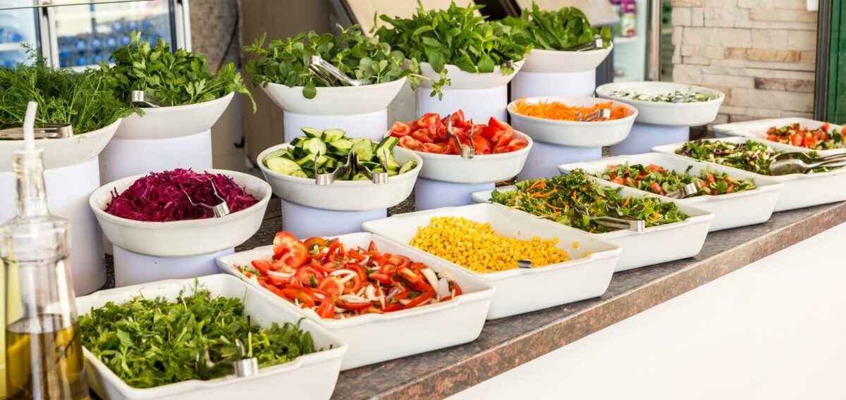 Variety of fresh salads in a buffet. Concept of all inclusive hotel and healthy eating - Texas View