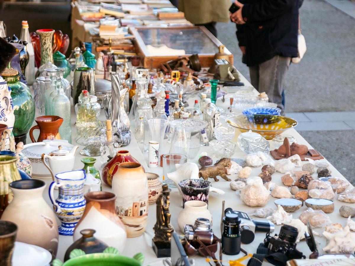 Flea market table with glassware and pottery - Texas News, Places, Food, Recreation, and Life.
