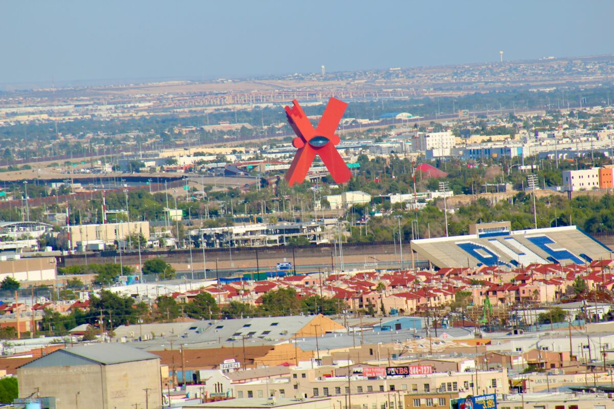Red X in Juarez, Mexico as seen from downtown El Paso, TX USA